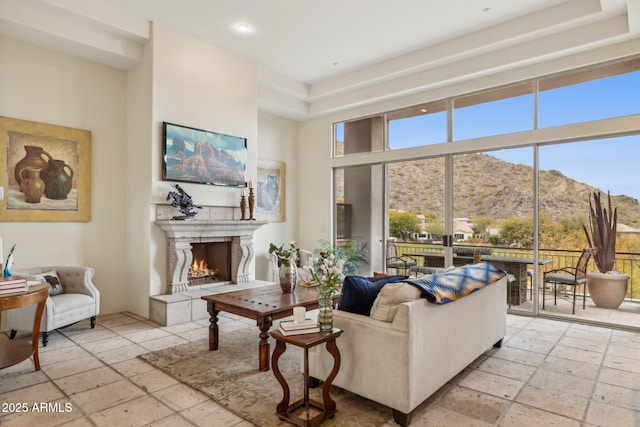 living room featuring a towering ceiling