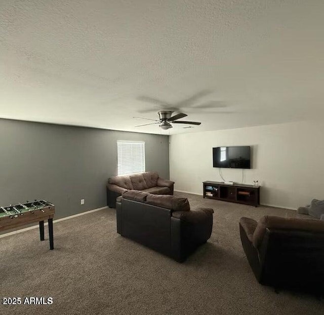 11644 W Redfield Rd, El Mirage, AZ 85335 - carpeted living area with baseboards, ceiling fan, and a textured ceiling