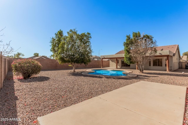 view of pool with a patio, a fenced backyard, and a fenced in pool