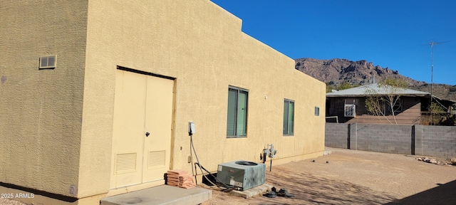 321 S Bridge St, Superior, AZ 85173 - view of side of home with central air condition unit and a mountain view