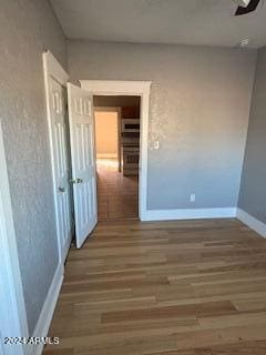 interior space with dark hardwood / wood-style flooring