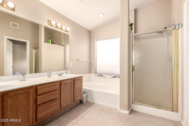 full bathroom with vaulted ceiling, a stall shower, a bath, and visible vents