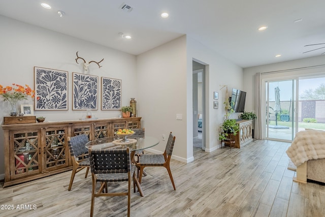 10509 W Harmony Ln, Peoria, AZ 85382 - dining room featuring wood finished floors, recessed lighting, and baseboards