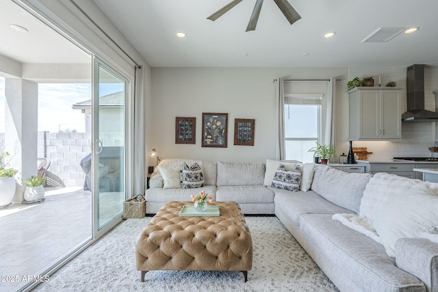 10509 W Harmony Ln, Peoria, AZ 85382 - living room with plenty of natural light, recessed lighting, and a ceiling fan