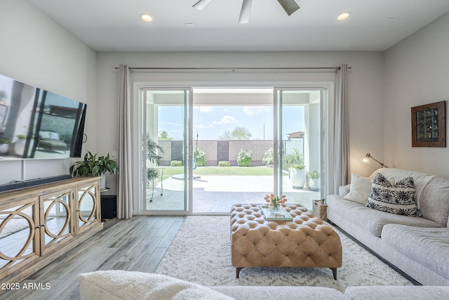10509 W Harmony Ln, Peoria, AZ 85382 - living area featuring wood finished floors, recessed lighting, and ceiling fan