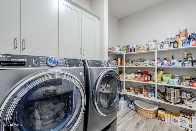 10509 W Harmony Ln, Peoria, AZ 85382 - laundry room featuring washing machine and dryer and wood finished floors