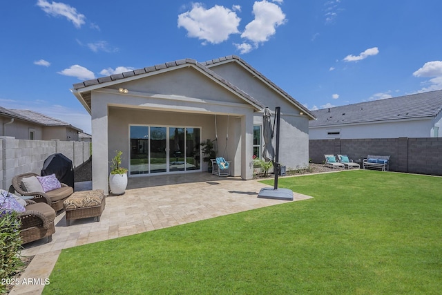 10509 W Harmony Ln, Peoria, AZ 85382 - rear view of house with a patio and stucco siding