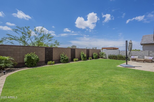 10509 W Harmony Ln, Peoria, AZ 85382 - view of yard featuring a patio area