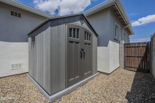 10509 W Harmony Ln, Peoria, AZ 85382 - view of shed featuring a gate