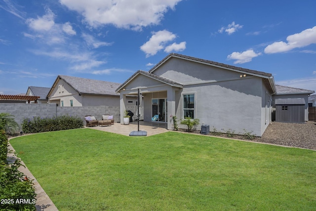 10509 W Harmony Ln, Peoria, AZ 85382 - rear view of house with a patio and stucco siding
