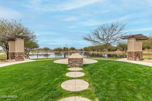 view of yard with a water view