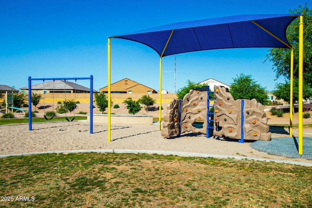 view of jungle gym with a yard