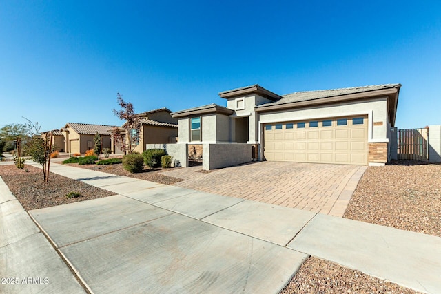 prairie-style house featuring a garage