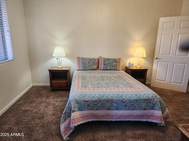 carpeted bedroom featuring baseboards