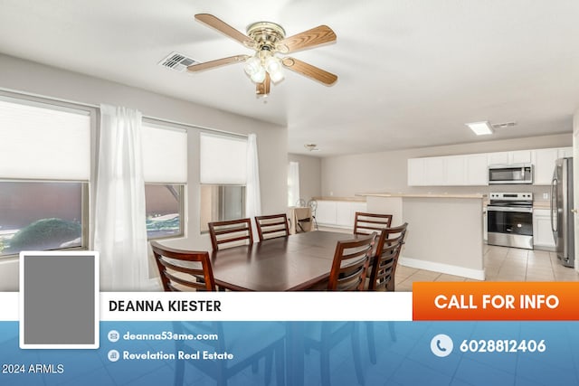 dining area featuring ceiling fan and light tile patterned floors