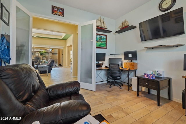 office featuring light hardwood / wood-style flooring and french doors