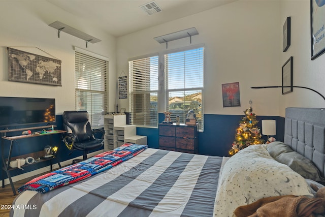 bedroom with wood-type flooring