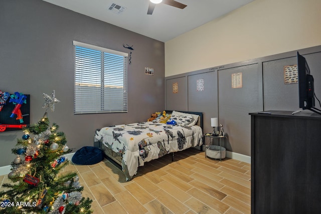 bedroom featuring ceiling fan and wood-type flooring