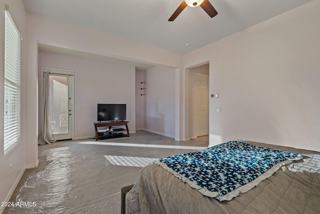 bedroom featuring ceiling fan and light colored carpet