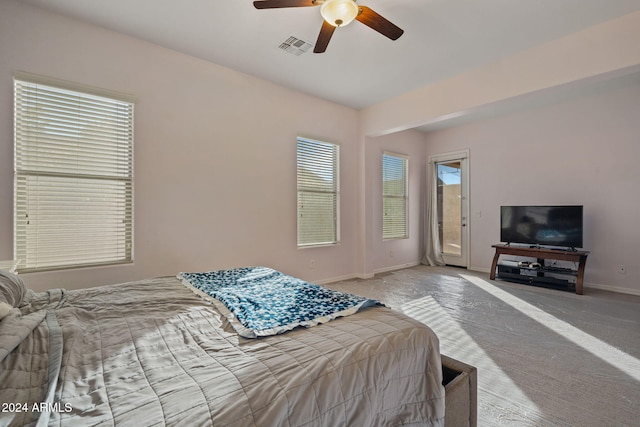 bedroom featuring access to outside, ceiling fan, and light colored carpet