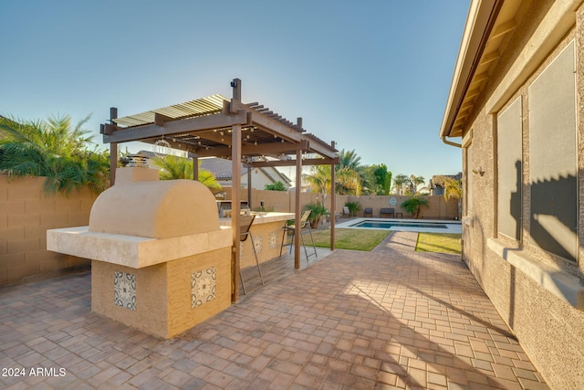 view of patio featuring a pergola and a fenced in pool