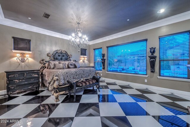 bedroom featuring a chandelier and crown molding