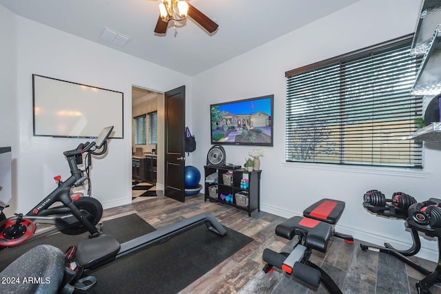 12789 W Via Caballo Blanco, Peoria, AZ 85383 - exercise area with baseboards, visible vents, wood finished floors, and a ceiling fan