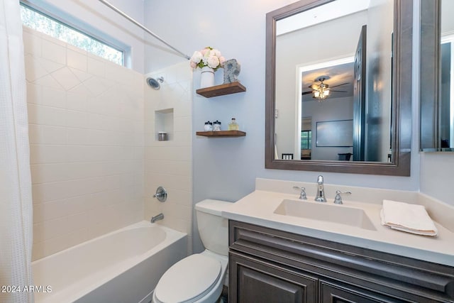 full bathroom with shower / bath combination with curtain, vanity, and toilet