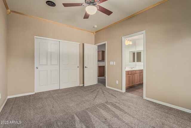 5752 S Crossbow Pl, Chandler, AZ 85249 - unfurnished bedroom featuring a closet, baseboards, carpet, crown molding, and ensuite bath