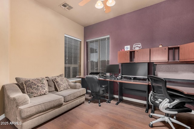 10529 E Posada Ave, Mesa, AZ 85212 - home office featuring light wood-style floors and a ceiling fan