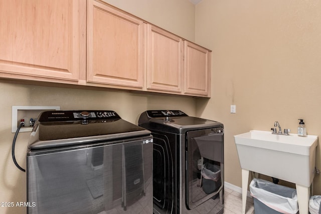 10529 E Posada Ave, Mesa, AZ 85212 - laundry area with separate washer and dryer, cabinet space, and light tile patterned floors