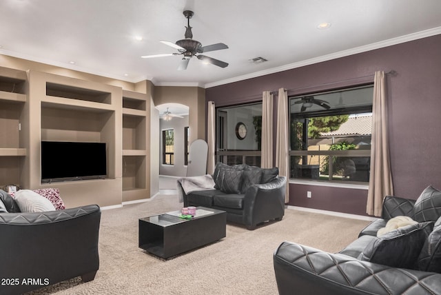 10529 E Posada Ave, Mesa, AZ 85212 - living room with ceiling fan, carpet, built in shelves, ornamental molding, and recessed lighting