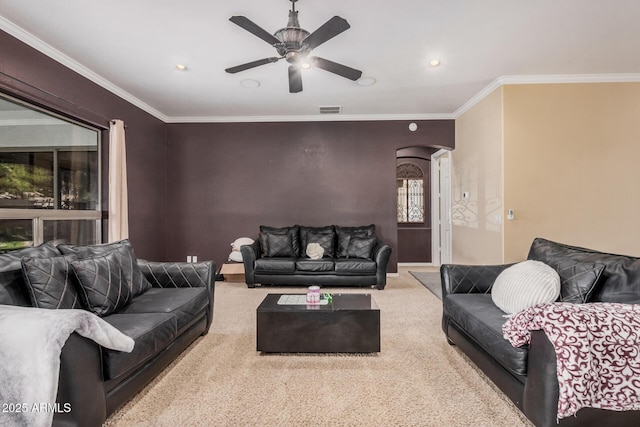 10529 E Posada Ave, Mesa, AZ 85212 - living room featuring arched walkways, carpet flooring, ceiling fan, crown molding, and recessed lighting