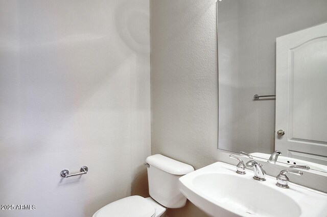 8068 W Carlota Ln, Peoria, AZ 85383 - bathroom with a sink and toilet