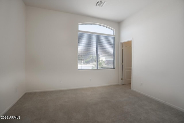 8068 W Carlota Ln, Peoria, AZ 85383 - empty room with light colored carpet and baseboards