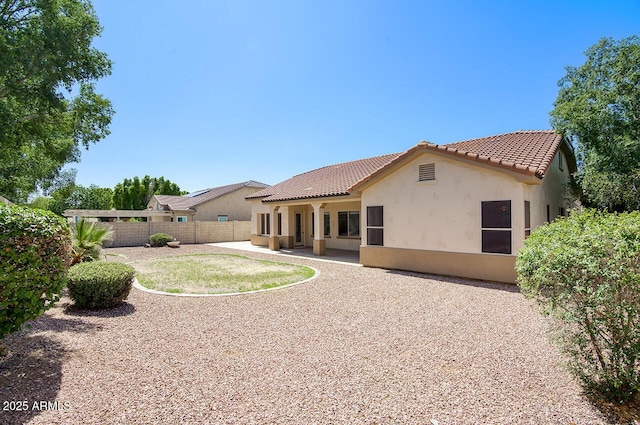 8068 W Carlota Ln, Peoria, AZ 85383 - rear view of property with stucco siding, a tiled roof, and a patio area