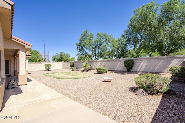 8068 W Carlota Ln, Peoria, AZ 85383 - fenced backyard with a patio