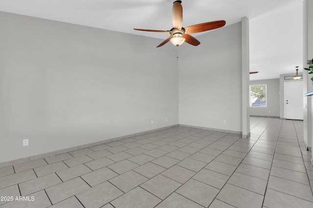 1858 S Ocotillo Dr, Apache Junction, AZ 85120 - empty room with ceiling fan and light tile patterned floors