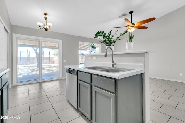 1858 S Ocotillo Dr, Apache Junction, AZ 85120 - kitchen featuring dishwasher, gray cabinetry, light countertops, and light tile patterned flooring