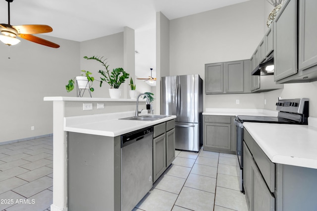 1858 S Ocotillo Dr, Apache Junction, AZ 85120 - kitchen featuring appliances with stainless steel finishes, a ceiling fan, gray cabinets, and light tile patterned floors