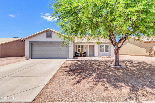 1858 S Ocotillo Dr, Apache Junction, AZ 85120 - single story home with an attached garage, stucco siding, concrete driveway, and a tile roof