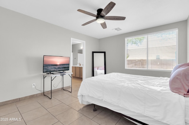 1858 S Ocotillo Dr, Apache Junction, AZ 85120 - bedroom featuring light tile patterned flooring, a ceiling fan, and ensuite bath