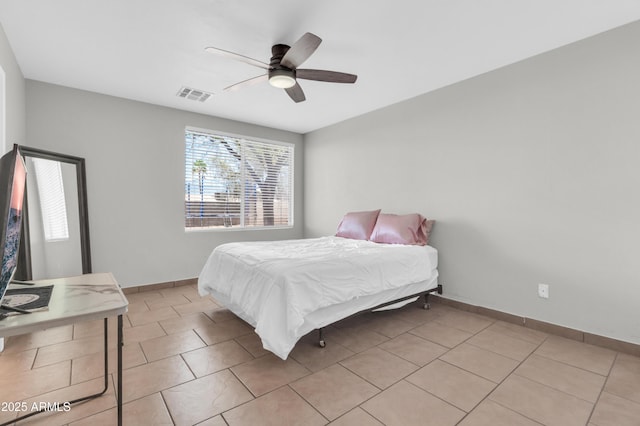 1858 S Ocotillo Dr, Apache Junction, AZ 85120 - bedroom featuring light tile patterned flooring and ceiling fan