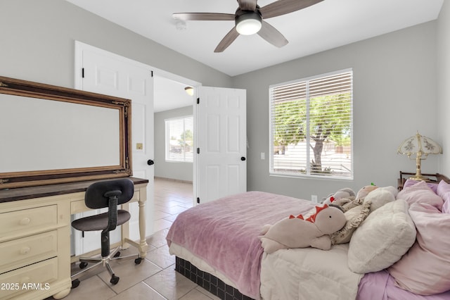 1858 S Ocotillo Dr, Apache Junction, AZ 85120 - bedroom with light tile patterned floors, an office area, and a ceiling fan