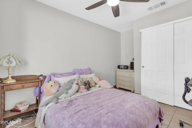 1858 S Ocotillo Dr, Apache Junction, AZ 85120 - tiled bedroom with ceiling fan and a closet