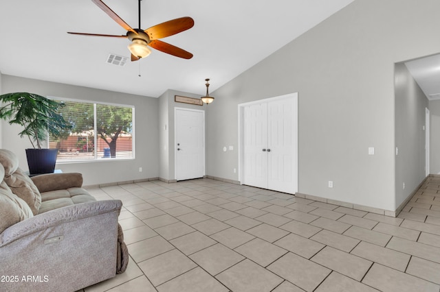 1858 S Ocotillo Dr, Apache Junction, AZ 85120 - living area with a ceiling fan, light tile patterned floors, and high vaulted ceiling