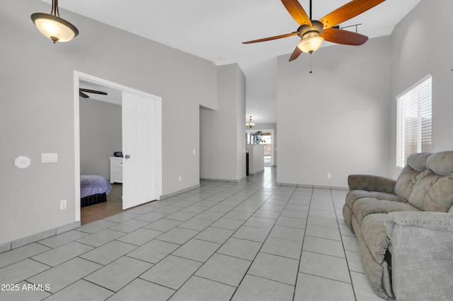 1858 S Ocotillo Dr, Apache Junction, AZ 85120 - living room featuring high vaulted ceiling, ceiling fan, and light tile patterned floors