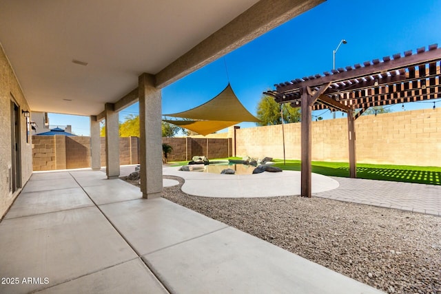 view of patio / terrace with a pergola and a swimming pool