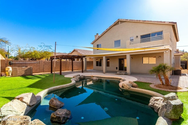 view of pool with a patio area, a yard, and a pergola