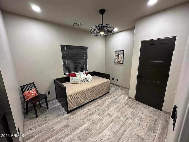 bedroom with light wood-type flooring